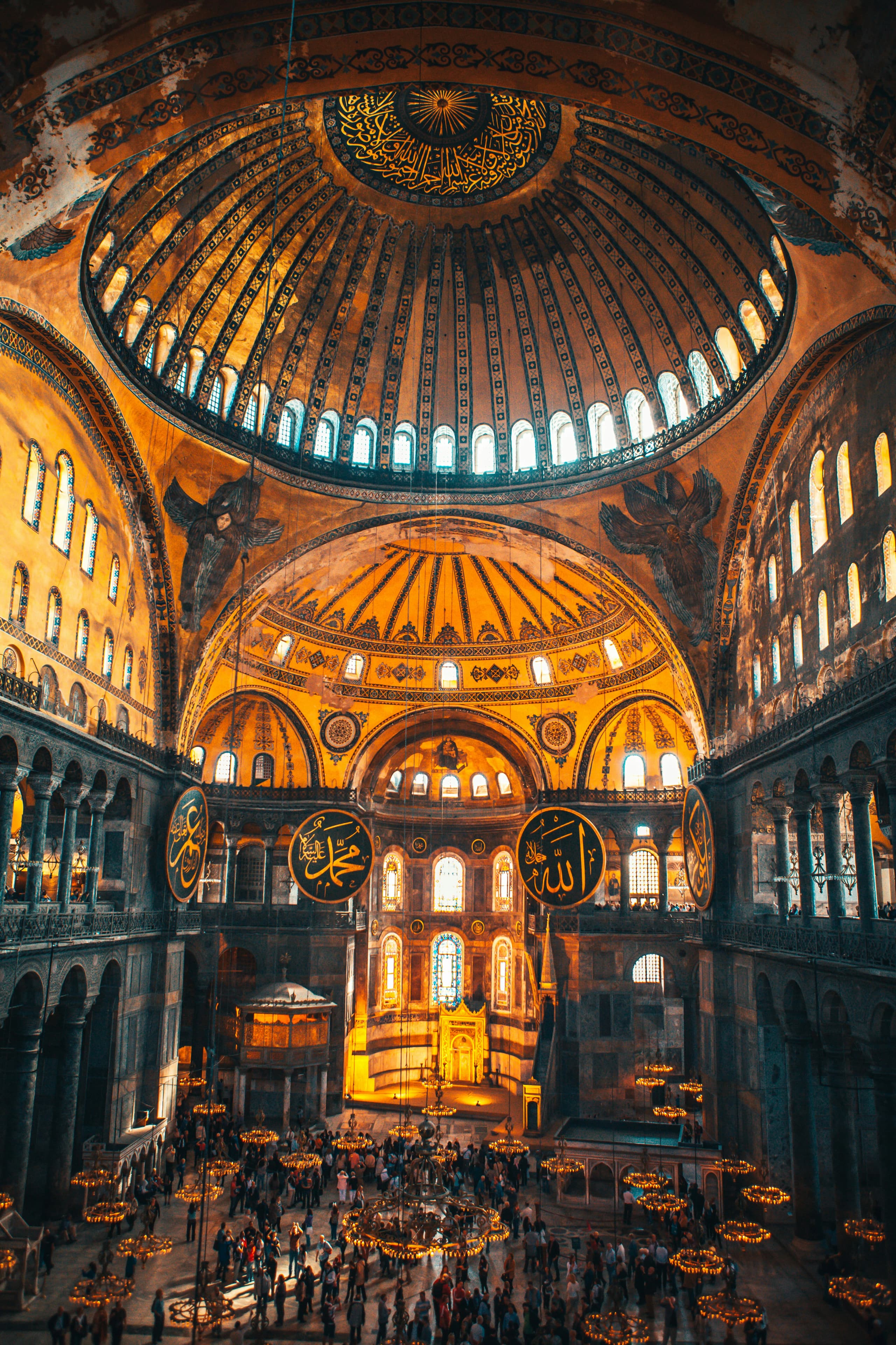 The vast lamplit interior of Hagia Sophia, Istanbul