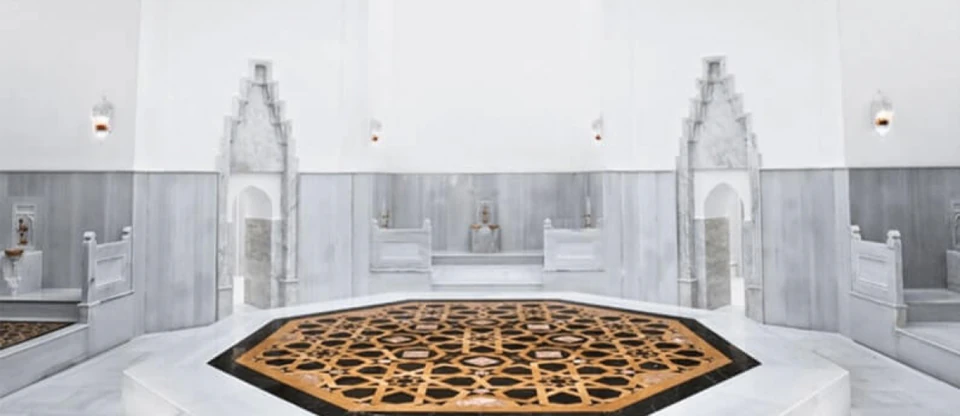 Light filtering through the domed ceiling of a traditional Turkish bath