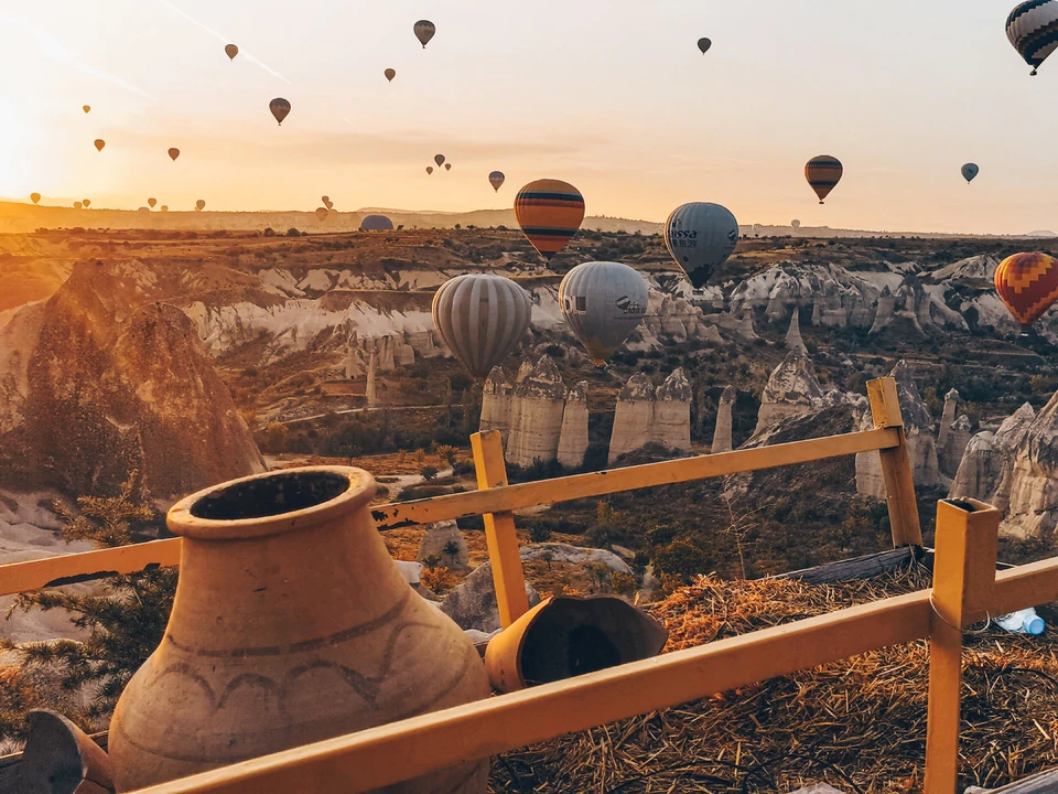 Colorful hot air balloons above Cappadocia's fairy chimneys
