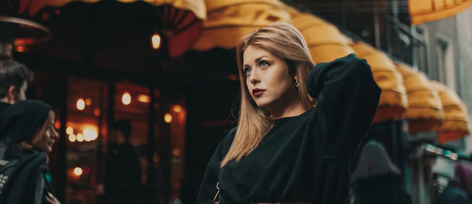 A photographer capturing Istanbul's bustling streets and towering mosques